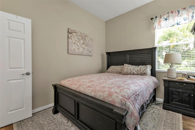 bedroom featuring light wood-type flooring