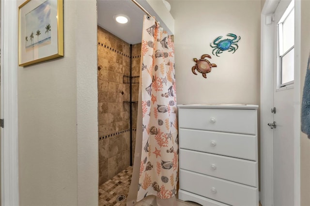 bathroom featuring a shower with curtain