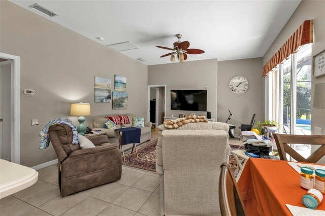 2388 Silver Palm Rd, North Port, FL 34288 - living area with a ceiling fan and light tile patterned floors