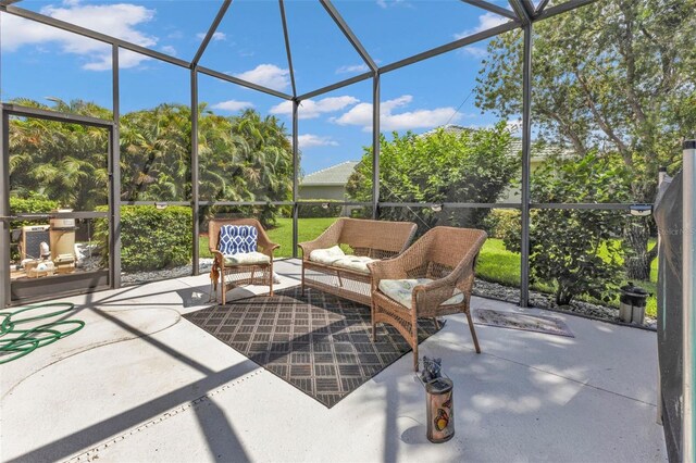 2388 Silver Palm Rd, North Port, FL 34288 - view of patio featuring an outdoor living space and glass enclosure