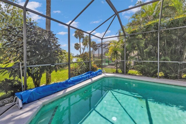 2388 Silver Palm Rd, North Port, FL 34288 - view of pool with a covered pool and glass enclosure