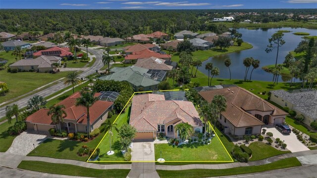 2388 Silver Palm Rd, North Port, FL 34288 - aerial perspective of suburban area with property parcel outlined and a nearby body of water