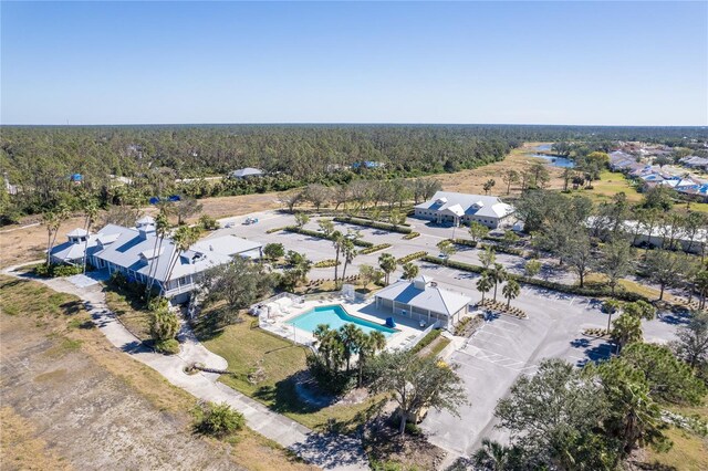 2388 Silver Palm Rd, North Port, FL 34288 - drone / aerial view of a pool area and a forest