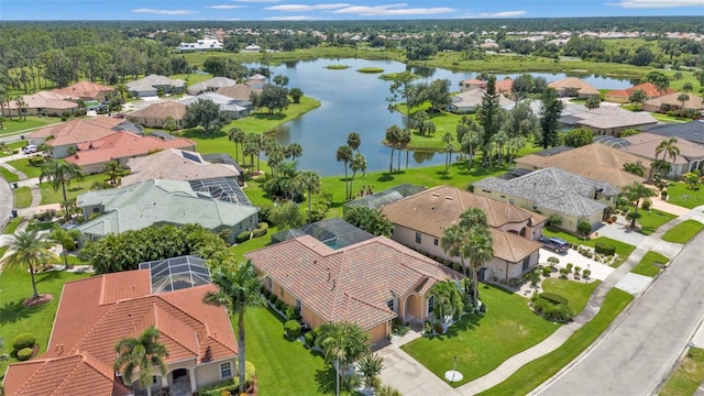 bird's eye view with a water view