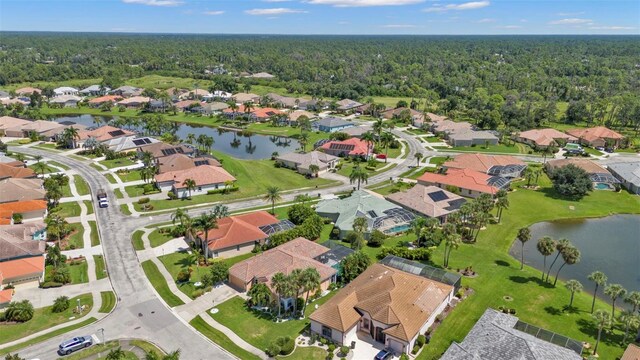 2388 Silver Palm Rd, North Port, FL 34288 - aerial overview of property's location with nearby suburban area and a heavily wooded area