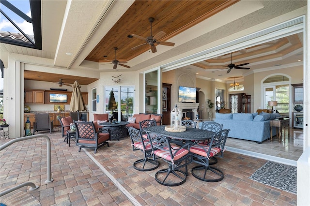 view of patio / terrace with an outdoor living space and ceiling fan