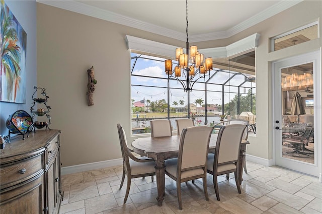 dining space featuring a chandelier and crown molding