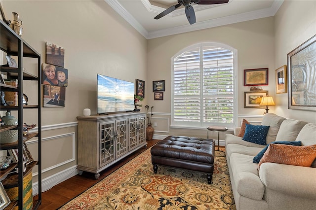 living room featuring ceiling fan, crown molding, and dark hardwood / wood-style flooring