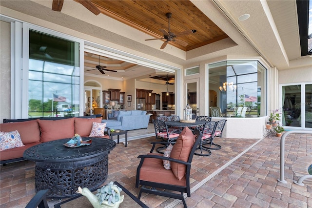 view of patio / terrace featuring an outdoor living space and ceiling fan