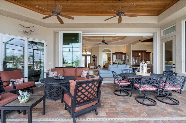 view of patio featuring an outdoor living space and ceiling fan