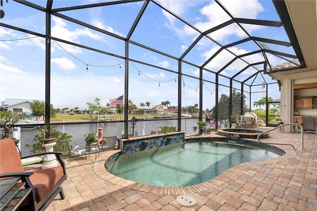 view of swimming pool with a lanai, a patio area, an in ground hot tub, and a water view