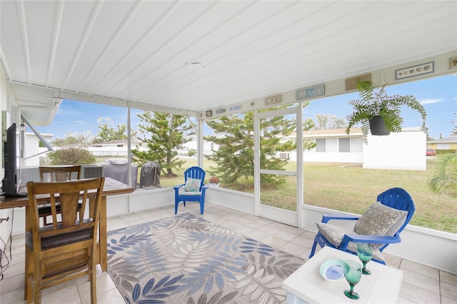 sunroom / solarium featuring a wealth of natural light