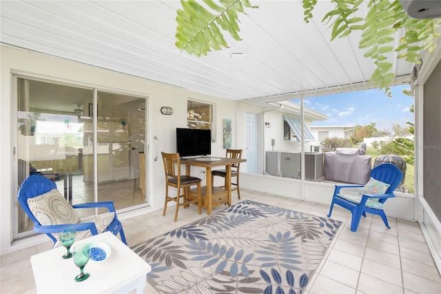 sunroom / solarium featuring a wealth of natural light