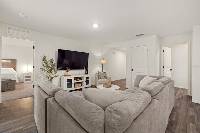 living room with dark wood-type flooring