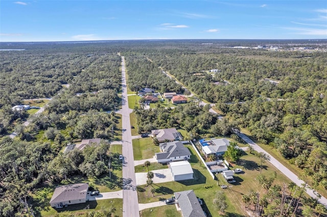 bird's eye view with a view of trees