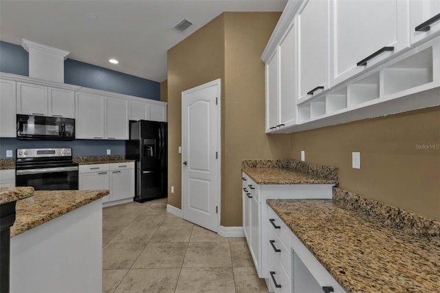 kitchen with stone counters, white cabinets, light tile patterned floors, and black appliances