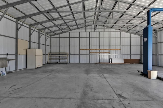 garage with white fridge