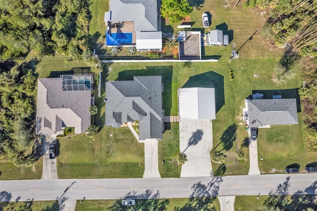 birds eye view of property with a residential view