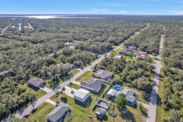 bird's eye view with a residential view and a view of trees