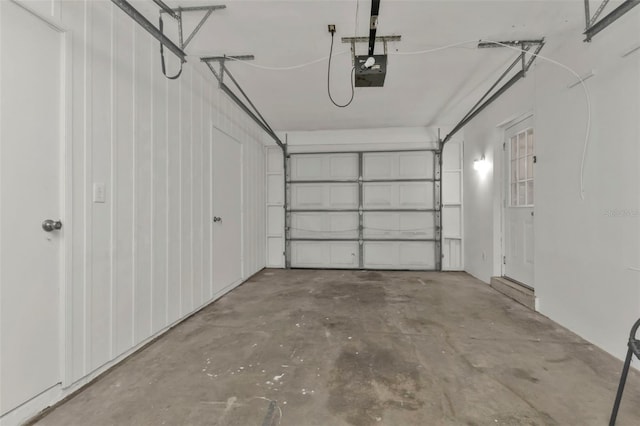 garage featuring a garage door opener