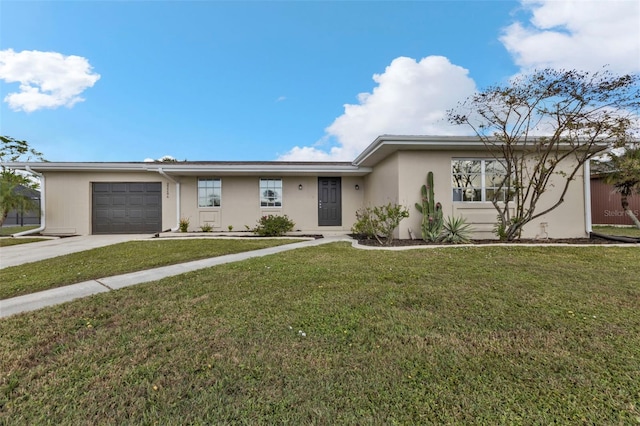 single story home with a garage and a front yard