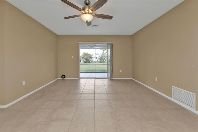 unfurnished room featuring ceiling fan and light tile patterned flooring