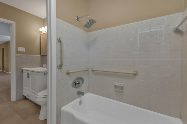 bathroom with tile patterned flooring, vanity, and toilet