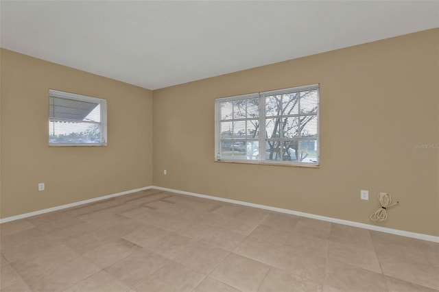 view of tiled spare room