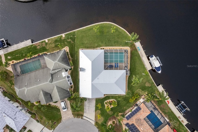 drone / aerial view with a water view