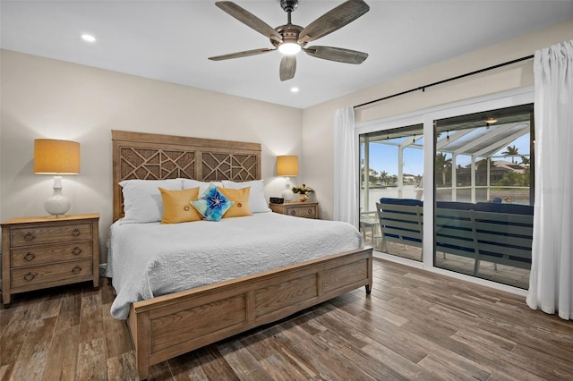 bedroom featuring ceiling fan, access to exterior, and dark hardwood / wood-style floors