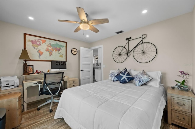 bedroom featuring wood-type flooring and ceiling fan