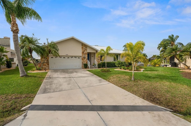 ranch-style home with a front lawn and a garage