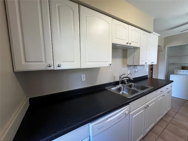 kitchen featuring dishwasher, white cabinetry, and washer / clothes dryer