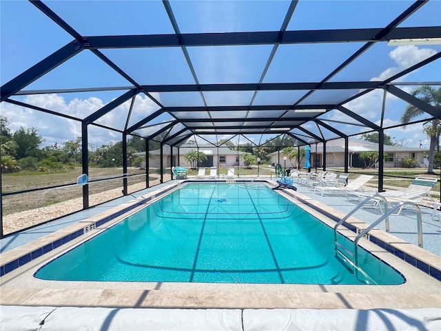 25068 Harborview Rd Unit 1A, Punta Gorda, FL 33980 - swimming pool featuring a patio and a lanai