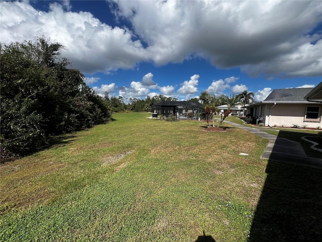 25068 Harborview Rd Unit 1A, Punta Gorda, FL 33980 - view of grassy yard