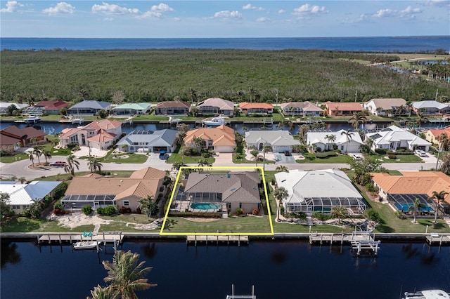 drone / aerial view with a water view