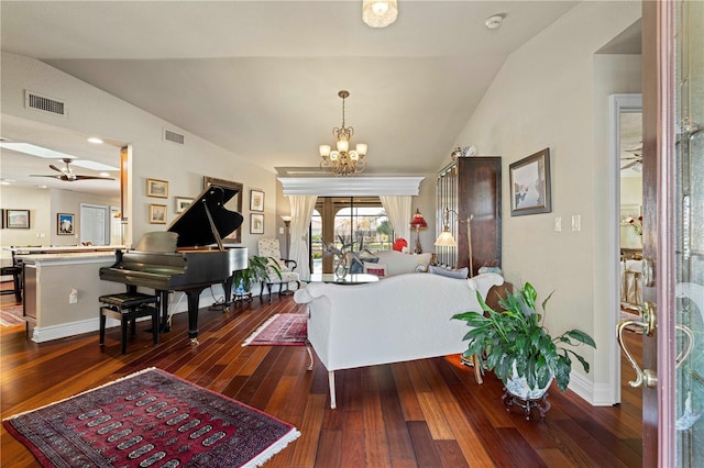 entryway featuring dark hardwood / wood-style flooring, ceiling fan with notable chandelier, and lofted ceiling