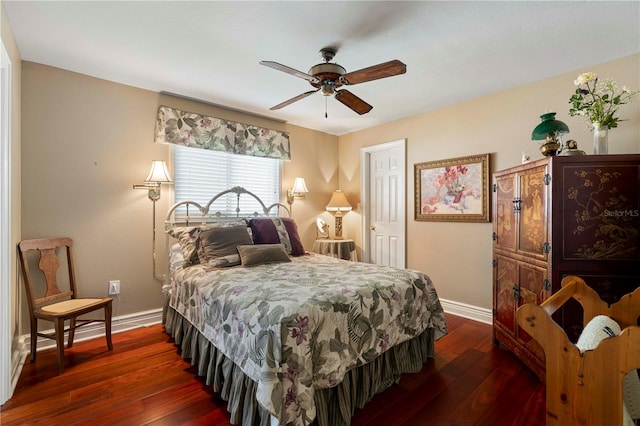 bedroom with ceiling fan and dark wood-type flooring