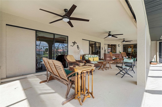 view of patio / terrace featuring outdoor lounge area and ceiling fan