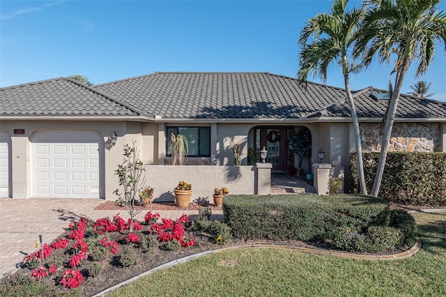 ranch-style home with a garage