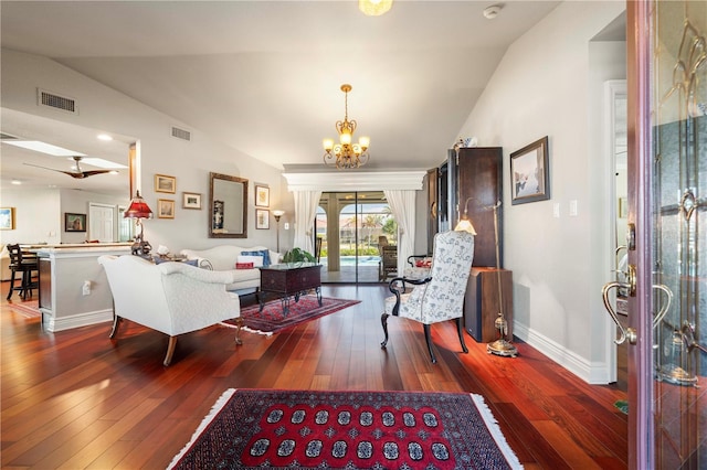 interior space with vaulted ceiling, wood-type flooring, and a chandelier