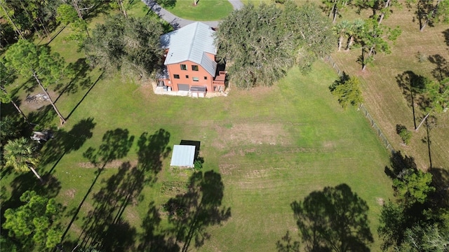 birds eye view of property featuring a rural view