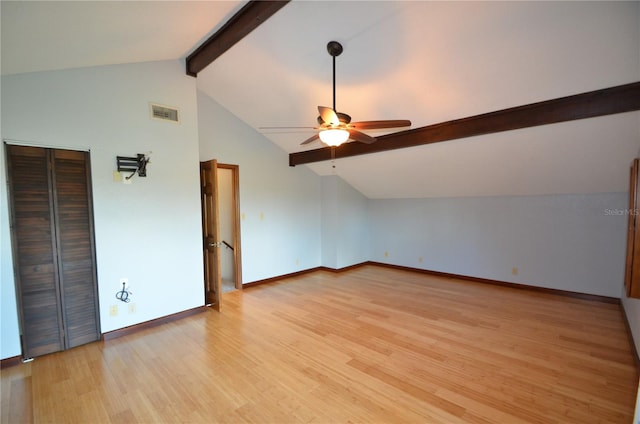 bonus room featuring lofted ceiling with beams, ceiling fan, and light wood-type flooring