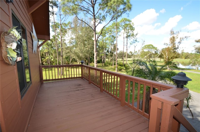 wooden terrace with a water view