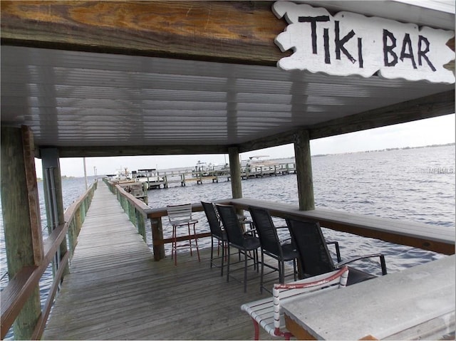 dock area featuring a water view