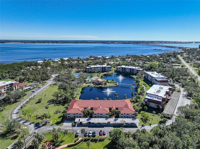 drone / aerial view with a water view