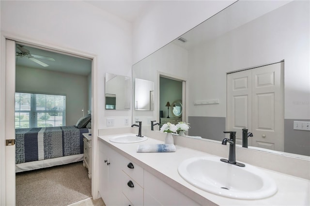 bathroom featuring vanity and ceiling fan