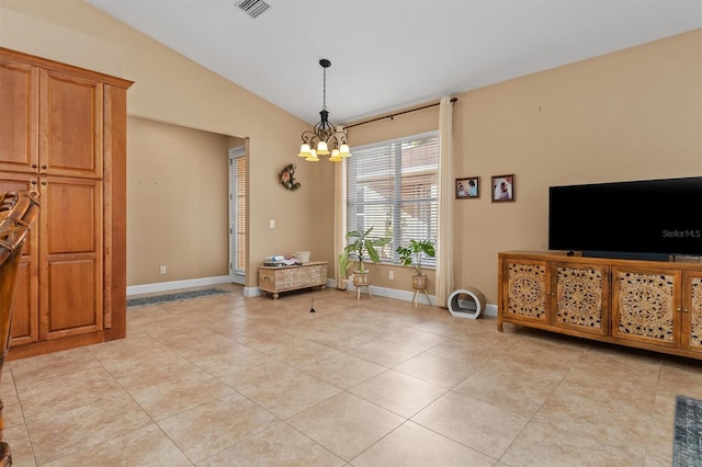 tiled dining area with lofted ceiling and a notable chandelier