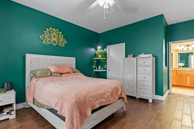 bedroom with wood-type flooring, ensuite bathroom, and ceiling fan