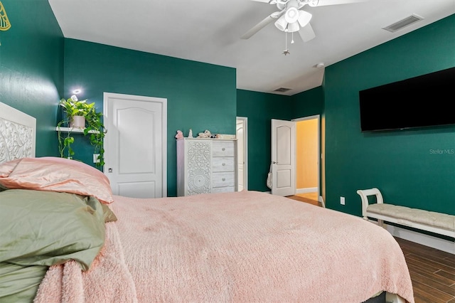 bedroom featuring ceiling fan and hardwood / wood-style floors